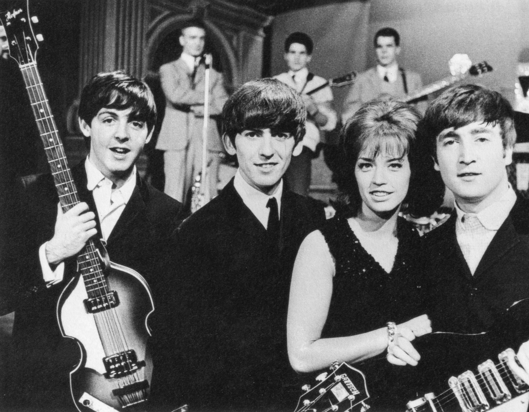 Paul McCartney, George Harrison, Swedish singer Lill-Babs, and John Lennon on the Swedish TV show Drop-In, 1963